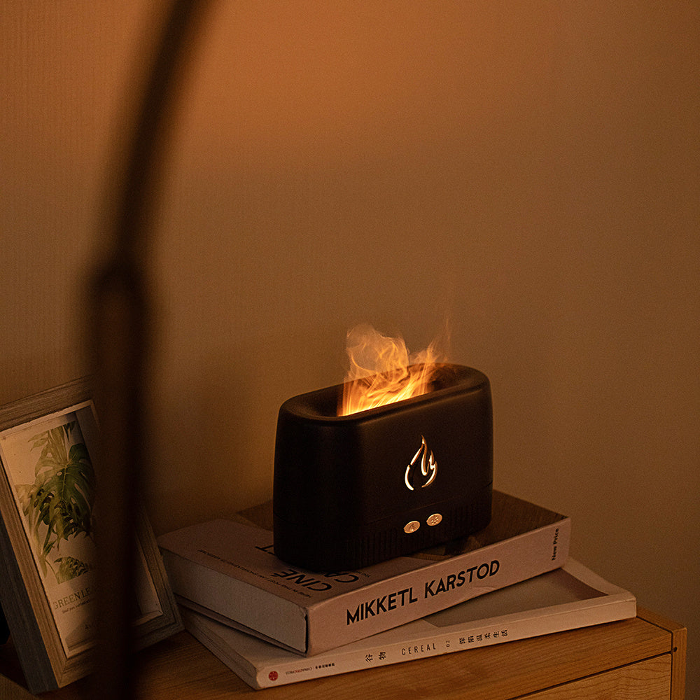 Factory-priced flame humidifier and aroma diffuser machine. Silent operation, perfect for home and bedroom use. Enhances your space with essential oil diffusion and a calming flame effect.