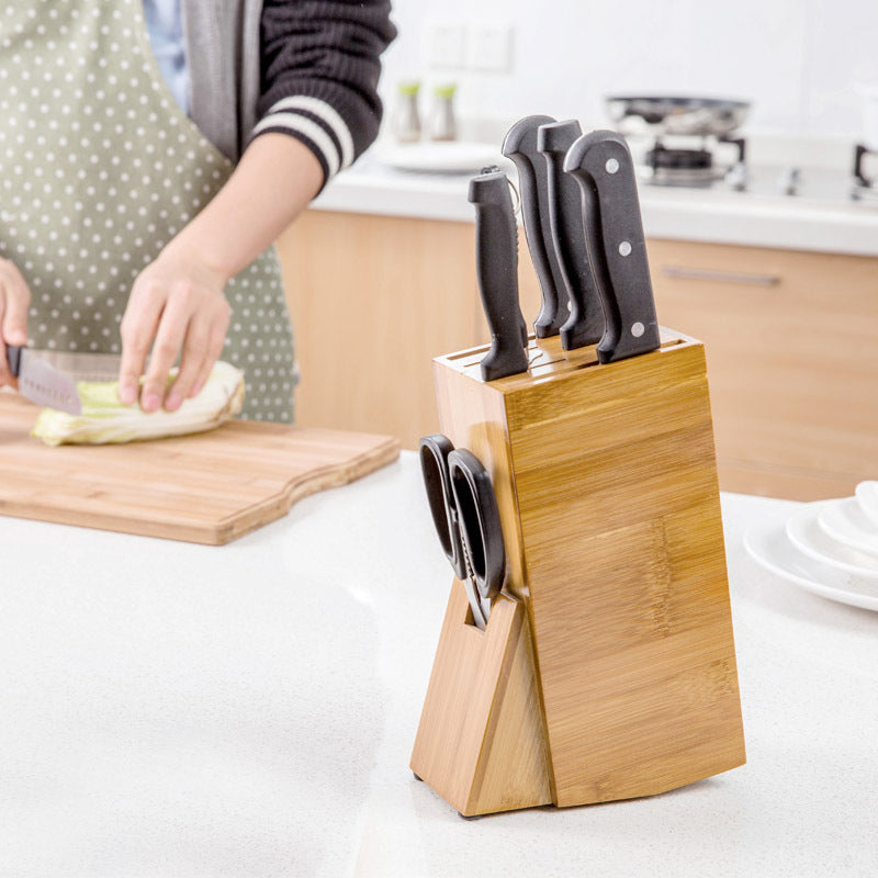 Bamboo kitchen accessories storage knife holder, designed to keep your knives organized and easily accessible. A stylish and eco-friendly addition to your kitchen for optimal storage and safety.