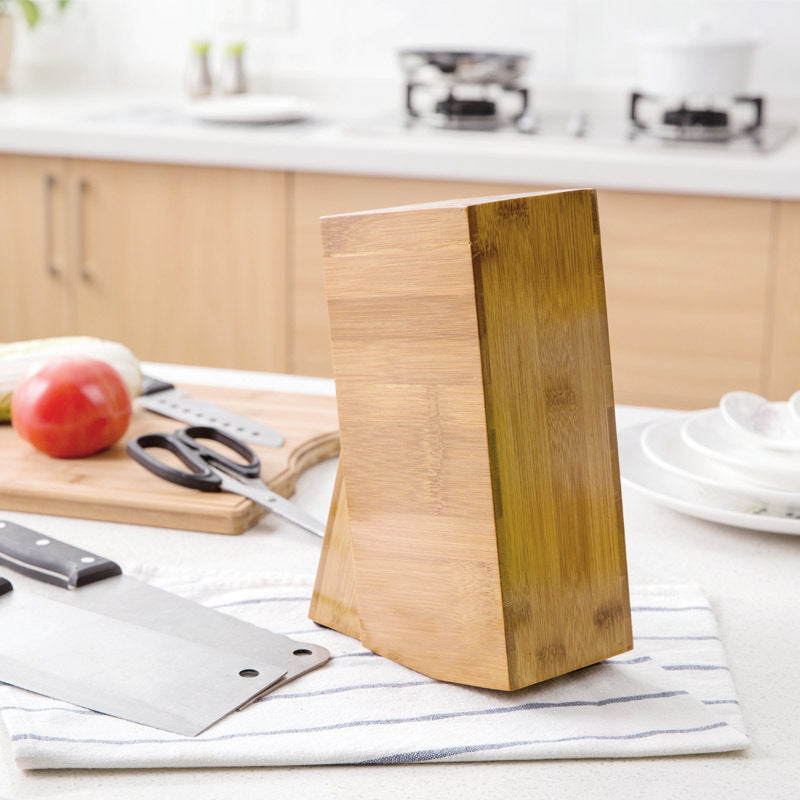 Bamboo kitchen accessories storage knife holder, designed to keep your knives organized and easily accessible. A stylish and eco-friendly addition to your kitchen for optimal storage and safety.