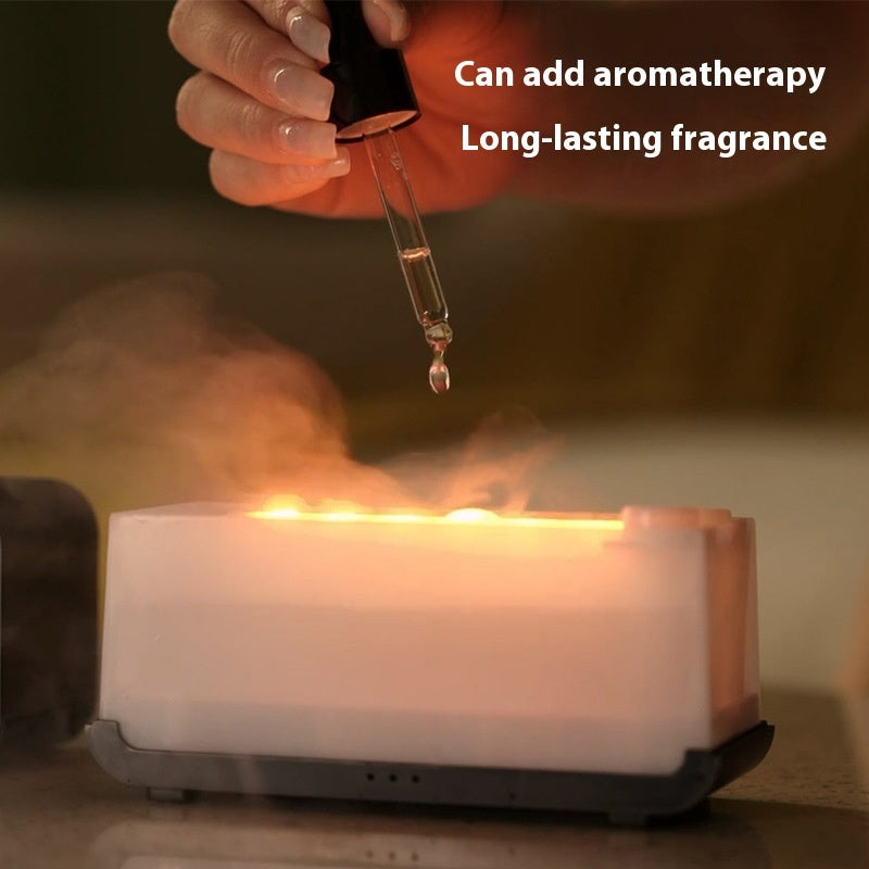 Timing simulation aroma diffuser and USB household flame humidifier. This aromatherapy machine sprays mist and creates a calming atmosphere, combining humidifying and diffusing functions for a soothing experience.