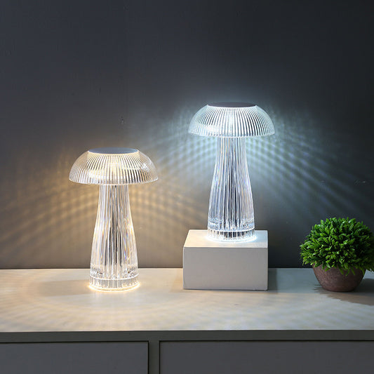 Simple acrylic lamp holder available in 3 colors, with plug-in and USB models. USB version includes a 16-ribbon remote control. Voltage: ≤36V. Creative crystal jellyfish table lamp with touch control, adding a touch of luxury and elegance to home décor.